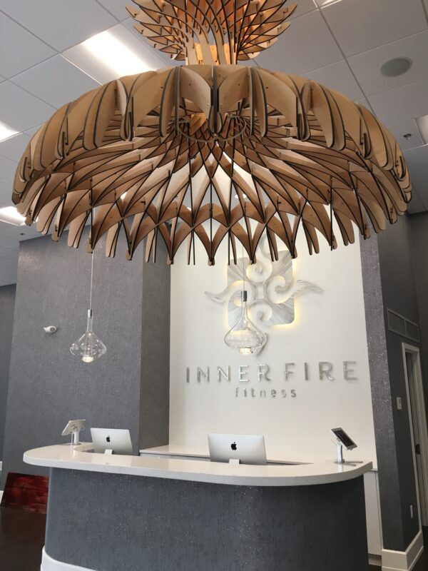 Sky-Fall pendants beneath a Bover Dome at the Inner Fire Fitness front desk