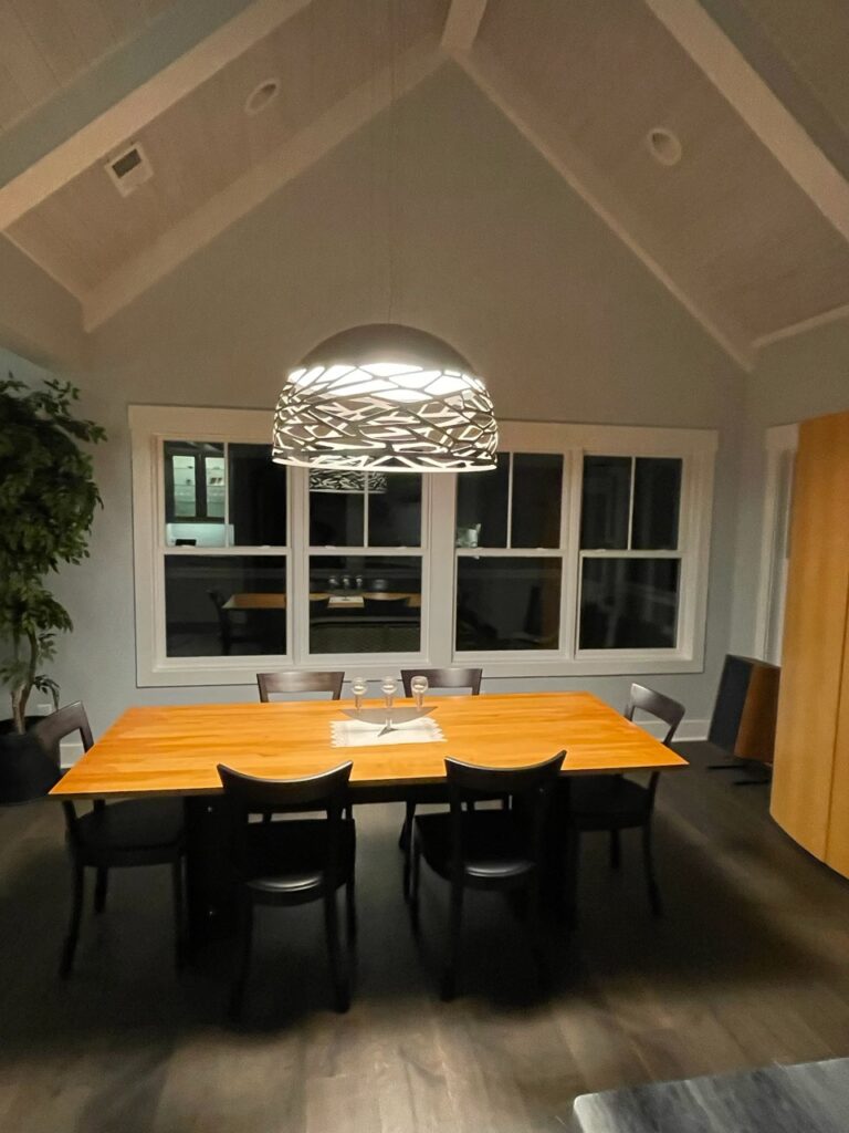 Large champagne Kelly Dome in a high-ceilinged living room in Hilton Head