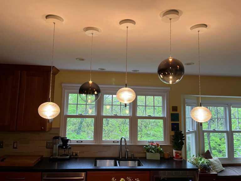Random Solo pendants over a kitchen sink