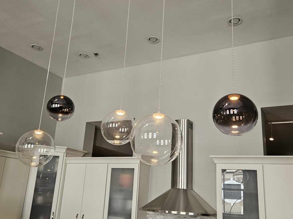 Lodes Random Solo spheres over a kitchen island