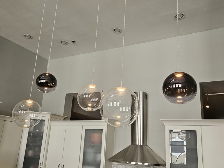 Random Solo pendants in a white kitchen