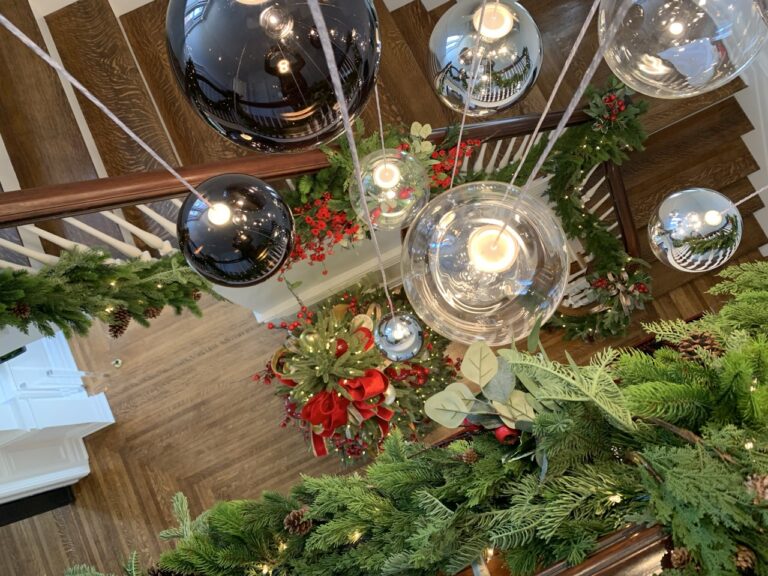 Random Solo spheres glowing above red and green holiday décor