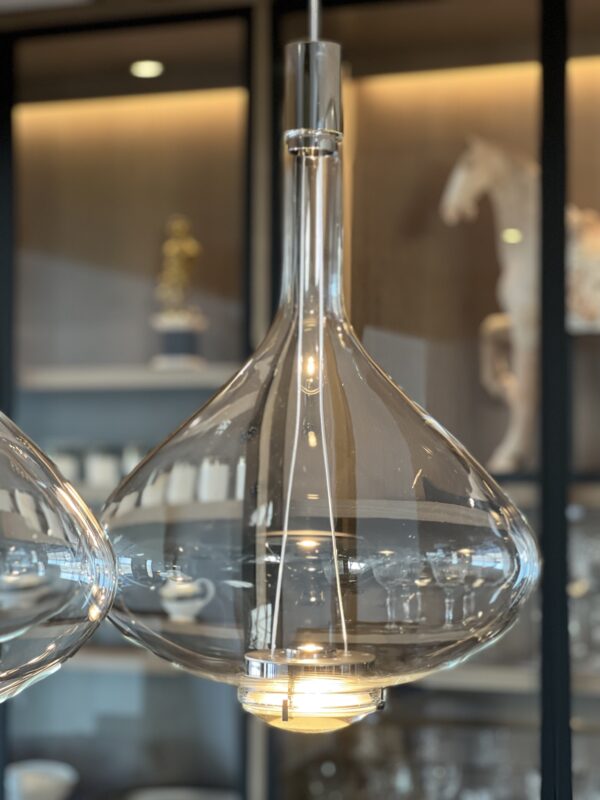 Close view of a clear Sky-Fall glass pendant