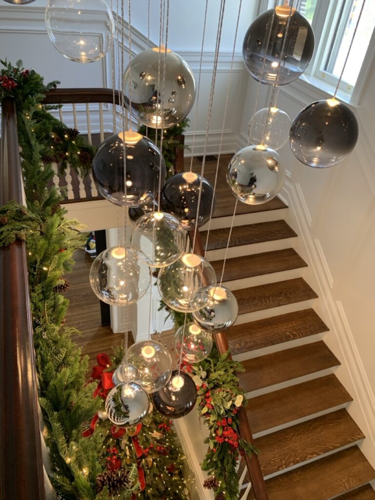 Random Solo cascade through a stairwell decorated for Christmas