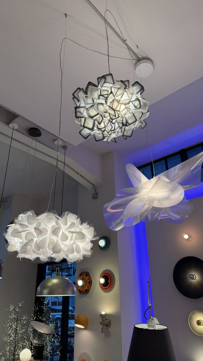 Slamp Clizia pendants in white and fumé in the Switch showroom