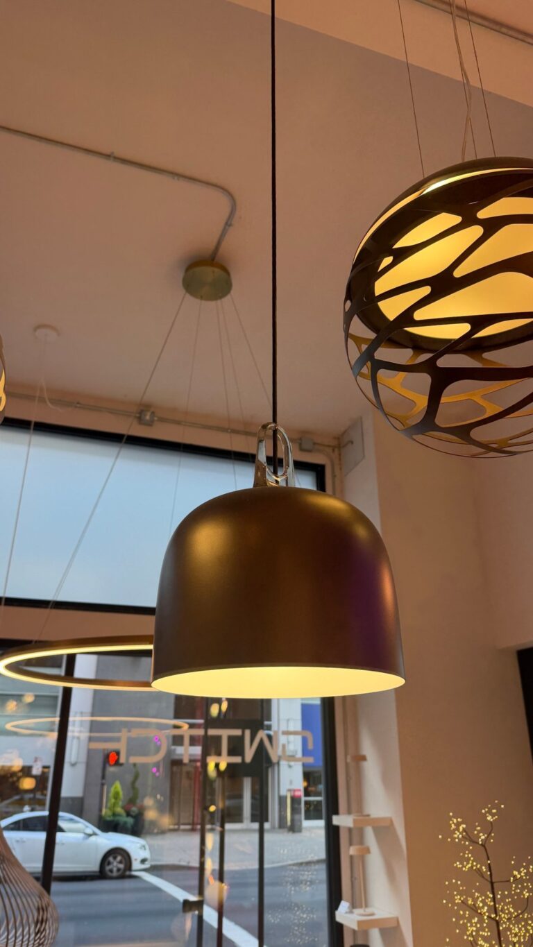 JIM bell in the Switch showroom next to a Kelly sphere