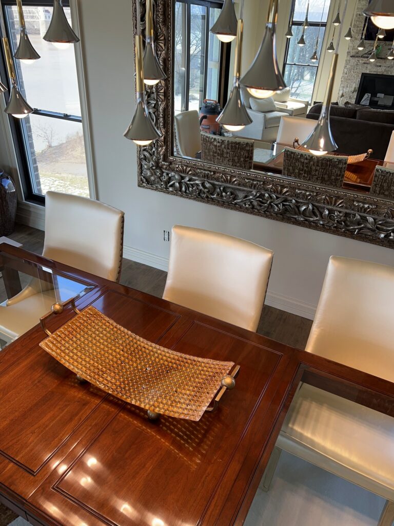Rain pendants above a wood dining table