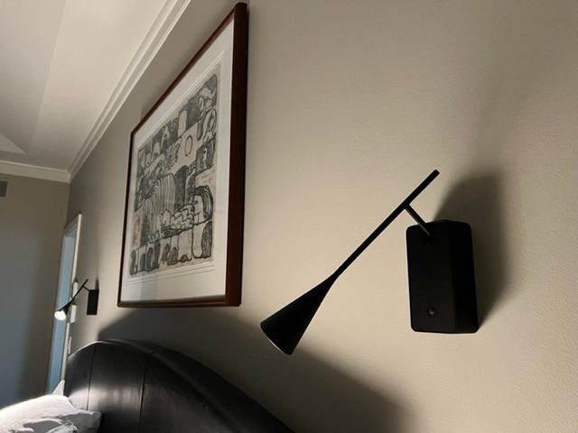 Bover Skybell wall light beside a bed
