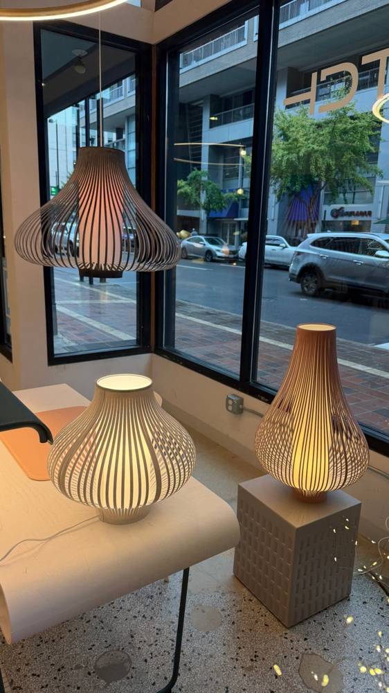 Uplight Group Blossom XL Pendant above the white Blossom Small Table Lamp and terra Blossom Table Lamp at Switch in Cincinnati
