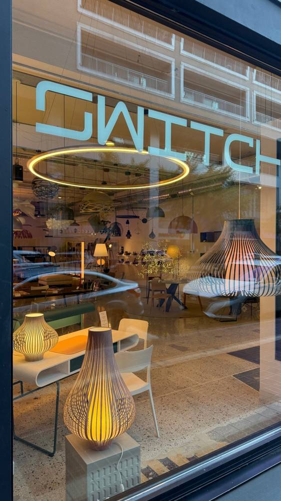 Blossom lamps by Uplight Group lit in the Switch Lighting & Design storefront window on E. 6th Street, Cincinnati
